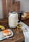 Фото - Электрочайник KitchenAid 5KEK1722EAC Creamy | click.ua