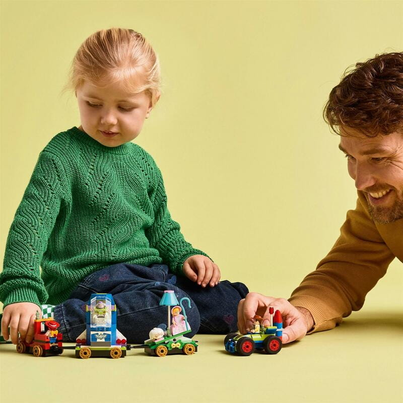 Конструктор LEGO Disney Pixar Святкування з Історії Іграшок: потяг і авто для перегонів (43264)